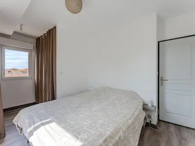 Un ou plusieurs lits dans un hébergement de l'établissement Maison spacieuse à Biscarrosse-Plage près de l'océan - FR-1-521-251