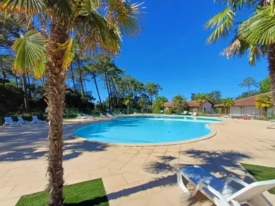 Piscine de l'établissement Maison confortable 6 pers, terrasse, résidence avec piscine et parking proche mer - FR-1-239-1118 ou située à proximité