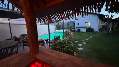 Piscine de l'établissement Villa TIKI BAR piscine chauffée 4 chambres ou située à proximité