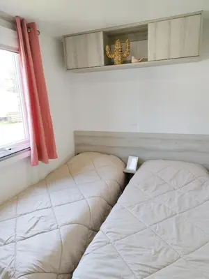 Un ou plusieurs lits dans un hébergement de l'établissement Mobil Home 6-8p 3ch 2sb Clim