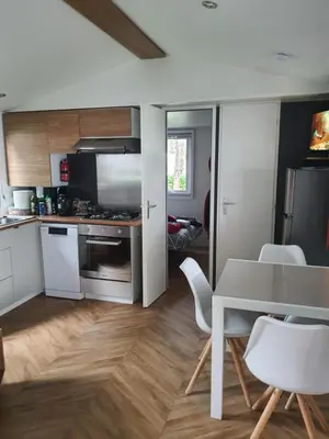 Cuisine ou kitchenette dans l'établissement Détente et Lac