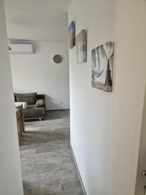 Coin salon dans l'établissement Appartement des Aubépines