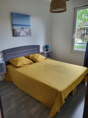 Un ou plusieurs lits dans un hébergement de l'établissement Terrasses du lac appt