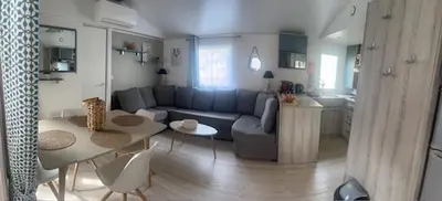 Coin salon dans l'établissement Mobil Home