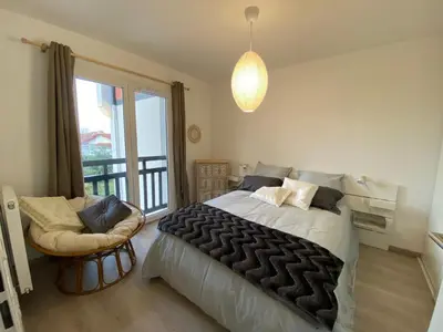 Un ou plusieurs lits dans un hébergement de l'établissement Appartement moderne proche centre Capbreton