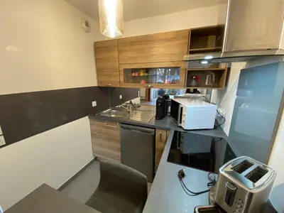 Cuisine ou kitchenette dans l'établissement Appartement moderne proche centre Capbreton