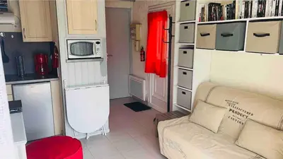 Cuisine ou kitchenette dans l'établissement La Coccinelle