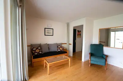 Coin salon dans l'établissement Appartement n 24 pour 4 à 6 personnes plages à pied