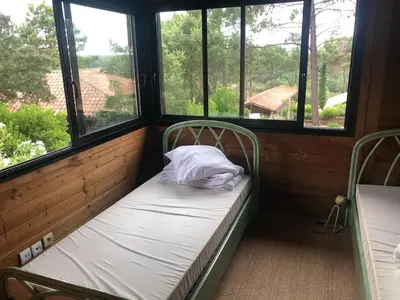 Un ou plusieurs lits dans un hébergement de l'établissement Villa de l'océan