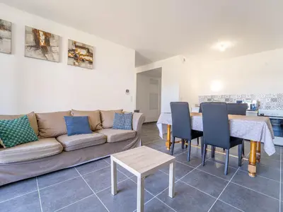 Coin salon dans l'établissement Appartement T3 neuf à Mimizan, 4 pers, proche centre, jardinet, parking inclus - FR-1-50-173