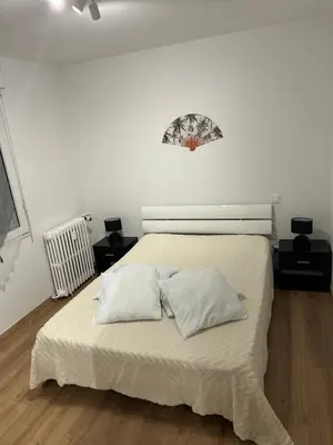 Un ou plusieurs lits dans un hébergement de l'établissement Appartement T2