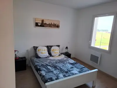 Un ou plusieurs lits dans un hébergement de l'établissement Maison de vacances avec jardin au Pays-Basque 88 m2
