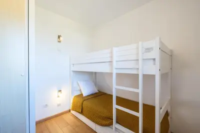 Un ou plusieurs lits dans un hébergement de l'établissement Escapade au Lac B09