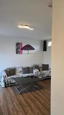 Coin salon dans l'établissement Maison de ville