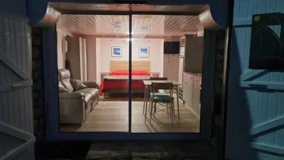 Coin salon dans l'établissement Villa MIRENSOU