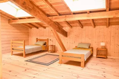 Un ou plusieurs lits dans un hébergement de l'établissement Villa éco-lodge sur pilotis - Piscine, Vélo, Plancha - entre Bayonne et Hossegor