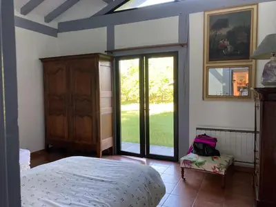 Un ou plusieurs lits dans un hébergement de l'établissement maison dans les landes avec piscine