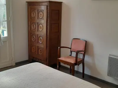 Un ou plusieurs lits dans un hébergement de l'établissement Maison spacieuse à Capbreton, proche port et plages, jusqu'à 6 personnes - FR-1-239-1122