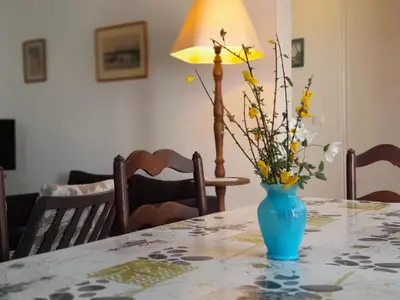 Coin salon dans l'établissement Maison spacieuse à Capbreton, proche port et plages, jusqu'à 6 personnes - FR-1-239-1122