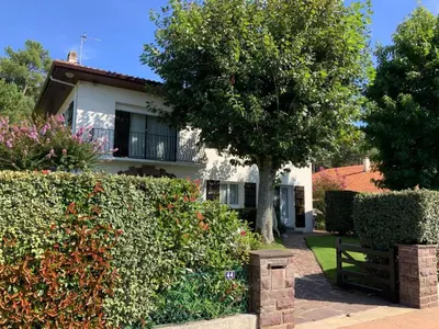 Jardin de l'établissement Appartement à Capbreton en bordure de forêt