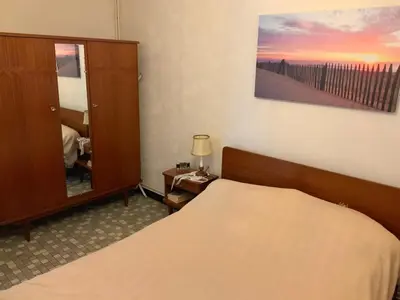 Un ou plusieurs lits dans un hébergement de l'établissement Appartement à Capbreton en bordure de forêt