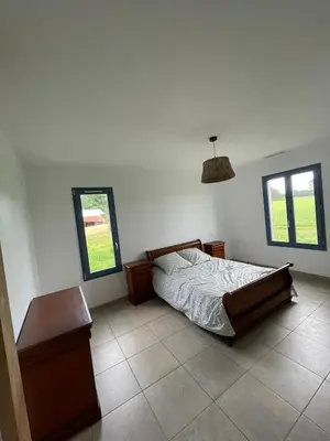 Un ou plusieurs lits dans un hébergement de l'établissement Charmante maison typique des Landes