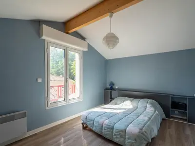 Un ou plusieurs lits dans un hébergement de l'établissement Spacieuse maison 3 chambres à Biscarrosse pour 6 personnes - FR-1-319-610