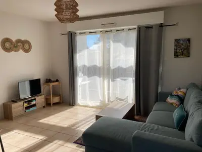 Télévision ou salle de divertissement dans l'établissement Appartement cosy au calme à Léon
