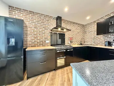 Cuisine ou kitchenette dans l'établissement L'Orangerie Urbaine central