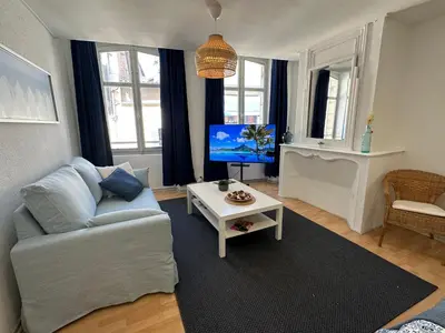 Télévision ou salle de divertissement dans l'établissement Les instants de Dax - Au coeur des thermes