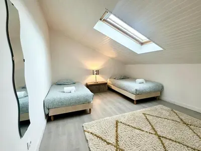 Un ou plusieurs lits dans un hébergement de l'établissement Duplex COSY - familial spacieux