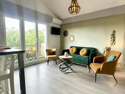 Coin salon dans l'établissement Duplex COSY - familial spacieux