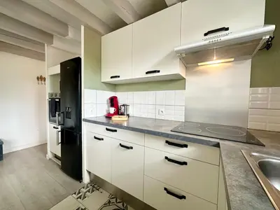 Cuisine ou kitchenette dans l'établissement Duplex COSY - familial spacieux