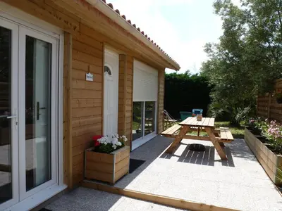 Jardin de l'établissement Maison style chalet au calme