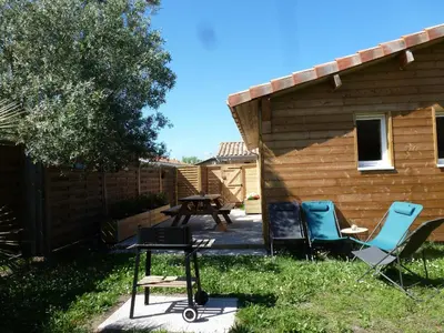 Jardin de l'établissement Maison style chalet au calme