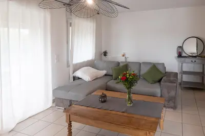 Coin salon dans l'établissement Appartement BRISE MARINE