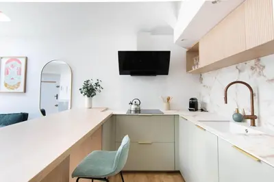 Cuisine ou kitchenette dans l'établissement Le Marco Polo