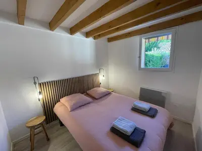 Un ou plusieurs lits dans un hébergement de l'établissement SLOW - Hossegor, océan & lac à pieds