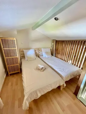Un ou plusieurs lits dans un hébergement de l'établissement Maisonette Landaise