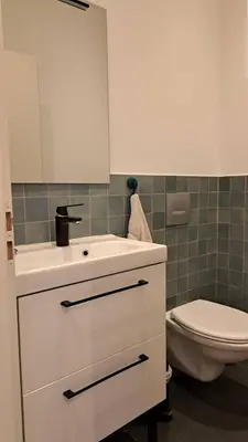 Salle de bains dans l'établissement Le Quai de Mezos