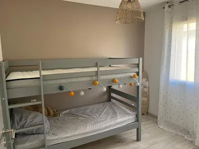 Un ou plusieurs lits dans un hébergement de l'établissement Villa au Teich cœur du Bassin d Arcachon 3 chambres