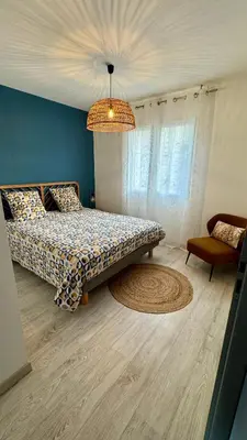 Un ou plusieurs lits dans un hébergement de l'établissement Villa au Teich cœur du Bassin d Arcachon 3 chambres