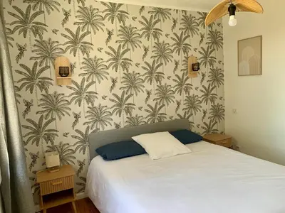Un ou plusieurs lits dans un hébergement de l'établissement La villa Jeanne- Charmante maison avec très belle terrasse couverte à 10 min du centre de Salies de Bearn