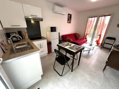 Cuisine ou kitchenette dans l'établissement Detente a deux