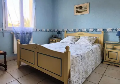 Un ou plusieurs lits dans un hébergement de l'établissement MENGINE - Jolie maison avec piscine