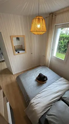 Un ou plusieurs lits dans un hébergement de l'établissement DaxLodge T3 cosy