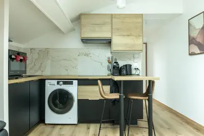 Cuisine ou kitchenette dans l'établissement Cocon Dacquois