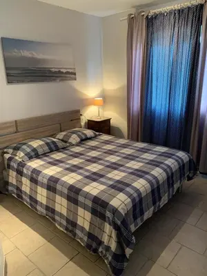 Un ou plusieurs lits dans un hébergement de l'établissement Logement à 200m de la plage