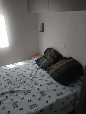 Un ou plusieurs lits dans un hébergement de l'établissement MH 285 O'HARA 3 chambres et 1 salle de bain dans camping 4 étoiles