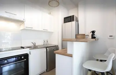 Cuisine ou kitchenette dans l'établissement Appartement Lumineux et Calme